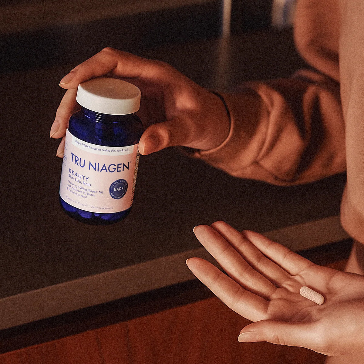Tru Niagen Beauty supplement for adults looking to support skin elasticity hydration and healthy hair and nails from within daily capsule
