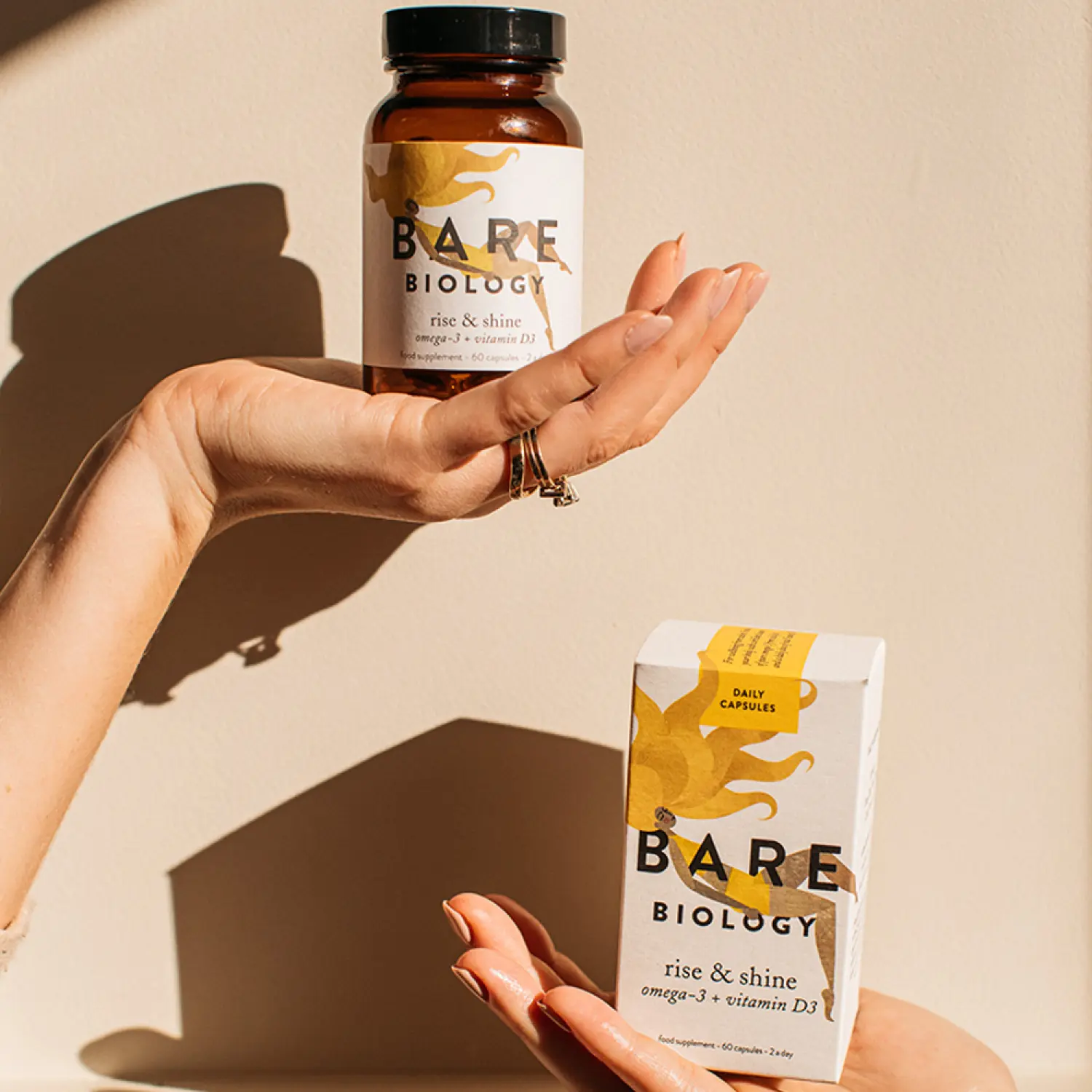 Bare Biology Rise & Shine omega 3 capsules with EPA DHA fish oil and vitamin D3 explaining cellular support and immune system benefits