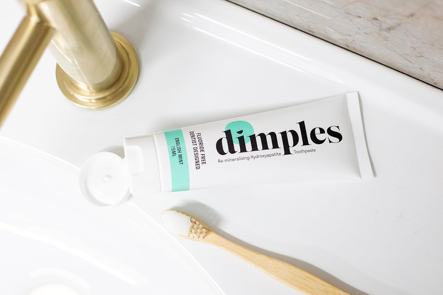 Dimples natural mint toothpaste for adults seeking a clean, chemical-free alternative to traditional fluoride toothpaste