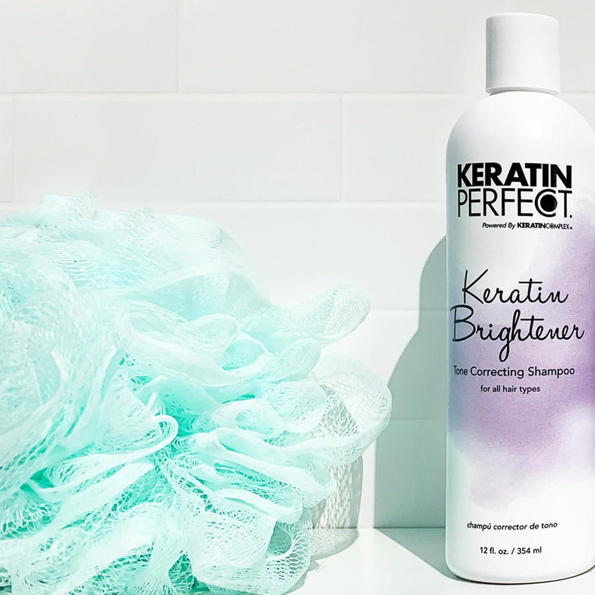 Keratin Perfect Brightener Tone Correcting Shampoo helps add moisture to hair for a soft feel and a smooth, shiny finish.
