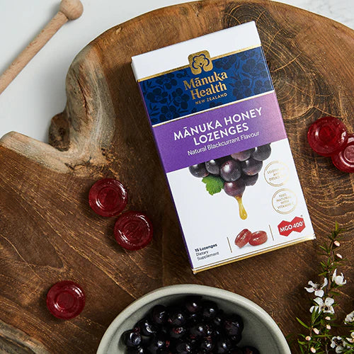 Manuka Health blackcurrant honey lozenges individually wrapped with MGO 400+ label detail