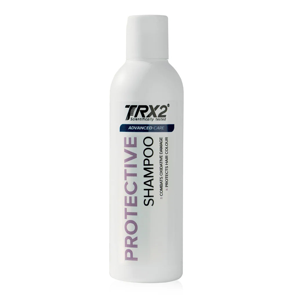 TRX2 Advanced Care Protective Shampoo 200ml helps care for dyed and stressed hair, leaving it looking glossy with a fuller finish.