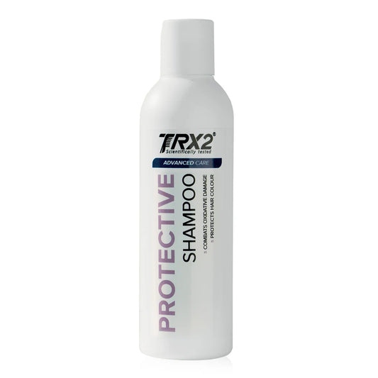 TRX2 Advanced Care Protective Shampoo 200ml helps care for dyed and stressed hair, leaving it looking glossy with a fuller finish.